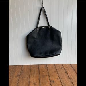 Black tote with brass accents